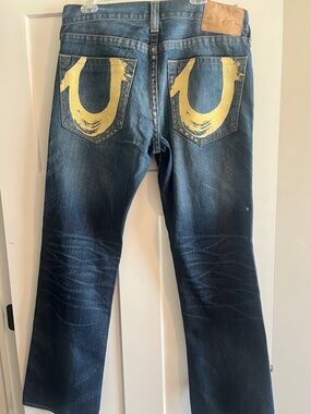 True Religion Blue Denim Jeans with Yellow Horseshoe Back Pockets